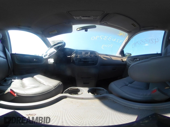 2003 Honda Odyssey EX-L with VIN 5FNRL18913B061340, listed as a IAAI auction lot 42633790 with 1,281,195 mi miles and . Bid and sale history available at DreamBid. Image 18.