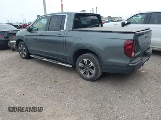 2018 Honda Ridgeline RTL-T with VIN 5FPYK3F61JB013733, listed as a IAAI auction lot 42548122 with 92,407 mi miles and . Bid and sale history available at DreamBid. Image 3.