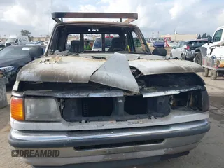 1994 Ford Ranger Splash z VIN 1FTCR14U5RPC39232, wystawiony jako IAAI lot #42090413 z przebiegiem Nie podano mil oraz . Historia ofert i sprzedaży dostępna na DreamBid. Obrazek 6.