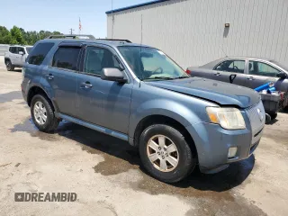 2010 Mercury Mariner with VIN 4M2CN8B7XAKJ03580, listed as a Copart auction lot 57269525 with 265,789 mi miles and Salvage title. Bid and sale history available at DreamBid. Image 4.