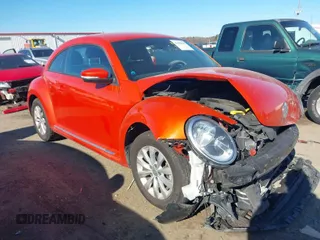 2019 Volkswagen Beetle S with VIN 3VWFD7AT7KM719940, listed as a IAAI auction lot 41190839 with 77,627 mi miles. Bid and sale history available at carsss.com. Image 1.