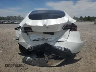 2022 Tesla Model Y Long Range z VIN 7SAYGDEE9NF455614, wystawiony jako Copart lot #57612985 z przebiegiem 22 101 mil mil oraz Szkoda całkowita • Salvage title. Historia ofert i sprzedaży dostępna na DreamBid. Obrazek 6.