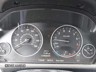 2014 BMW 4 Series 435i with VIN WBA3T3C50EJ876997, listed as a IAAI auction lot 42406299 with 115,048 mi miles and . Bid and sale history available at DreamBid. Image 7.