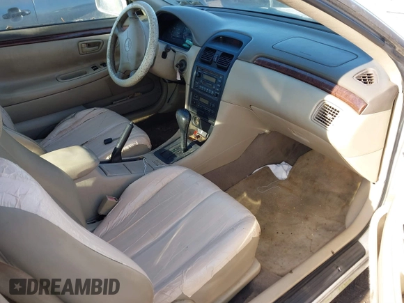 1999 Toyota Solara SE with VIN 2T1CF28P6XC214984, listed as a IAAI auction lot 41527487 with 222,960 mi miles. Bid and sale history available at carsss.com. Image 5.