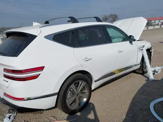 2024 Genesis GV80 z VIN KMUHCESC6RU160904, wystawiony jako IAAI lot #40675389 z przebiegiem 6 984 mil mil oraz . Historia ofert i sprzedaży dostępna na DreamBid. Obrazek 4.