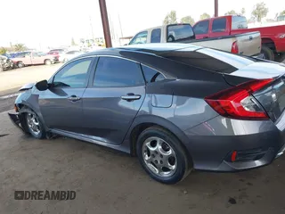 2020 Honda Civic Sedan LX with VIN 2HGFC2F61LH552858, listed as a IAAI auction lot 41554396 with 166,982 mi miles. Bid and sale history available at carsss.com. Image 15.