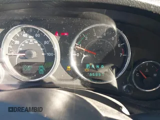 2014 Jeep Wrangler Unlimited Rubicon X with VIN 1C4BJWFG3EL134522, listed as a IAAI auction lot 41221381 with 66,897 mi miles and . Bid and sale history available at DreamBid. Image 7.