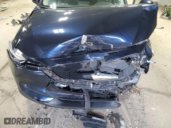 2020 Mazda CX-5 Touring z VIN JM3KFBCM5L1847751, wystawiony jako Copart lot #51189715 z przebiegiem 51 572 mil mil oraz Szkoda całkowita • Salvage title. Historia ofert i sprzedaży dostępna na DreamBid. Obrazek 12.