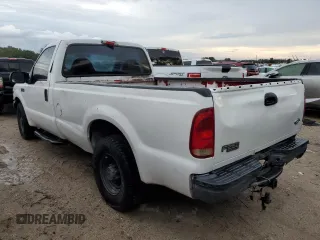 2000 Ford Super Duty F-250 XL with VIN 1FTNF20L8YEA71116, listed as a Copart auction lot 73739324 with 303,338 mi miles and Salvage Title. Bid and sale history available at carsss.com. Image 2.