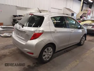 2013 Toyota Yaris L with VIN JTDKTUD36DD557084, listed as a IAAI auction lot 41502228 with 174,185 mi miles. Bid and sale history available at carsss.com. Image 4.