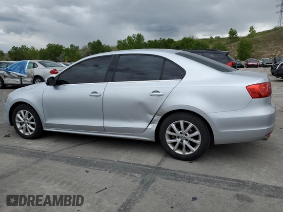 2014 Volkswagen Jetta SE with VIN 3VWD17AJ0EM314456, listed as a Copart auction lot 57380645 with 148,801 mi miles and Salvage title. Bid and sale history available at DreamBid. Image 2.