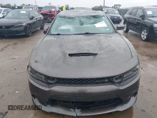 2020 Dodge Charger Scat Pack z VIN 2C3CDXGJXLH107344, wystawiony jako IAAI lot #41888453 z przebiegiem Nie podano mil oraz . Historia ofert i sprzedaży dostępna na DreamBid. Obrazek 13.