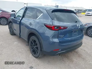 2024 Mazda CX-5 2.5 S Carbon Edition with VIN JM3KFBCL0R0516680, listed as a IAAI auction lot 42140335 with 30,170 mi miles. Bid and sale history available at carsss.com. Image 3.