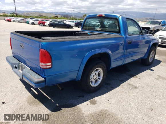 2000 Dodge Dakota z VIN 1B7FL26X5YS682973, wystawiony jako Copart lot #56680405 z przebiegiem 90 762 mil mil oraz Czysty tytuł • Clean title. Historia ofert i sprzedaży dostępna na DreamBid. Obrazek 3.