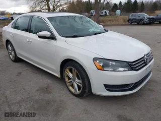 2014 Volkswagen Passat SE w/Sunroof with VIN 1VWBS7A36EC051767, listed as a IAAI auction lot 41858670 with 121,270 mi miles. Bid and sale history available at carsss.com. Image 1.