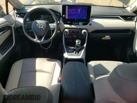 2023 Toyota RAV4 Hybrid XLE Premium с VIN JTMB6RFV0PD084497, выставлен на аукционе Copart как лот 64655015 с пробегом 23 481 миль миль и Списание • Salvage title. История ставок и продаж доступна на DreamBid. Изображение 8.