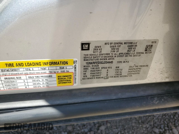 2016 Chevrolet Traverse LS z VIN 1GNKRFED3GJ204445, wystawiony jako Copart lot #52771545 z przebiegiem 118 417 mil mil oraz Szkoda całkowita • Salvage title. Historia ofert i sprzedaży dostępna na DreamBid. Obrazek 13.