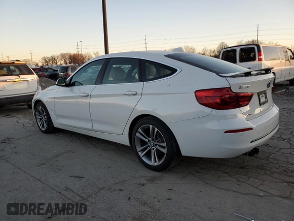 2018 BMW 3 Series 330i xDrive with VIN WBA8Z9C57JB220596, listed as a Copart auction lot 83203274 with 64,145 mi miles and Salvage Title. Bid and sale history available at carsss.com. Image 2.