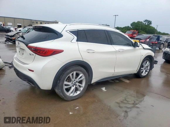 2018 Infiniti QX30 Premium with VIN SJKCH5CP2JA056283, listed as a Copart auction lot 60574585 with 102,573 mi miles and Salvage title. Bid and sale history available at DreamBid. Image 3.