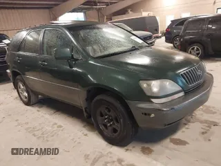 1999 Lexus RX 300 Luxury SUV with VIN JT6HF10U2X0077268, listed as a IAAI auction lot 41908556 with 240,501 mi miles. Bid and sale history available at carsss.com. Image 1.