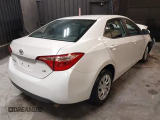 2019 Toyota Corolla L with VIN 5YFBURHE9KP871926, listed as a IAAI auction lot 42038212 with 72,475 mi miles and . Bid and sale history available at DreamBid. Image 4.