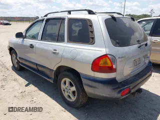 2004 Hyundai Santa Fe GLS with VIN KM8SC13DX4U592070, listed as a IAAI auction lot 42030363 with 296,823 mi miles. Bid and sale history available at carsss.com. Image 3.