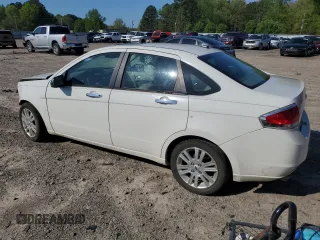 2010 Ford Focus SEL with VIN 1FAHP3HN1AW149134, listed as a Copart auction lot 52318815 with 244,171 mi miles and Salvage Title. Bid and sale history available at carsss.com. Image 2.