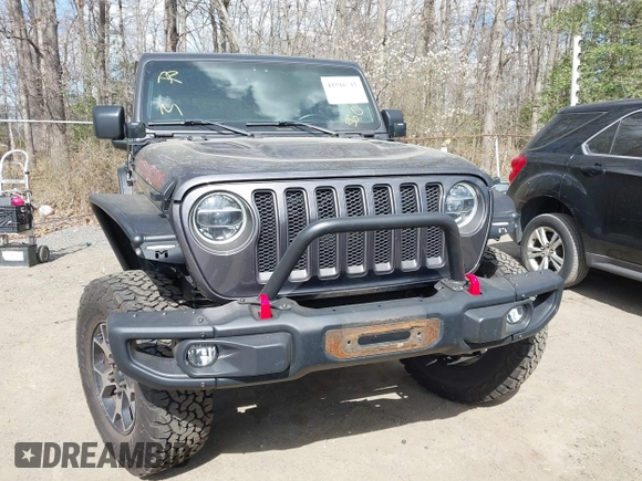 2018 Jeep Wrangler Unlimited Rubicon with VIN 1C4HJXFG8JW111195, listed as a IAAI auction lot 41916718 with 190,158 mi miles and . Bid and sale history available at DreamBid. Image 12.
