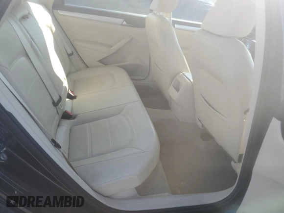 2012 Volkswagen Passat SE z VIN 1VWBH7A36CC108576, wystawiony jako Copart lot #56299105 z przebiegiem 110 815 mil mil oraz Szkoda całkowita • Salvage title. Historia ofert i sprzedaży dostępna na DreamBid. Obrazek 10.