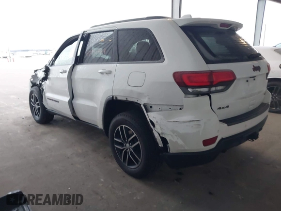 2018 Jeep Grand Cherokee Trailhawk with VIN 1C4RJFLGXJC264438, listed as a IAAI auction lot 40974417 with 117,717 mi miles and . Bid and sale history available at DreamBid. Image 3.