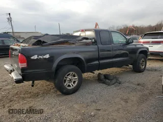2003 Dodge Dakota с VIN 1D7HG32X93S273172, выставлен на аукционе Copart как лот 80704424 с пробегом 141 409 миль миль и Списание • Salvage title. История ставок и продаж доступна на DreamBid. Изображение 3.