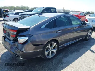 2019 Honda Accord Touring with VIN 1HGCV2F92KA016179, listed as a IAAI auction lot 41975156 with 101,674 mi miles and . Bid and sale history available at DreamBid. Image 4.