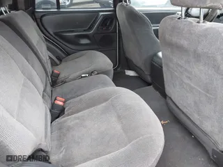 1999 Jeep Grand Cherokee Laredo with VIN 1J4GW58S9XC673310, listed as a IAAI auction lot 41927682 with 999,999 mi miles. Bid and sale history available at carsss.com. Image 8.
