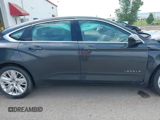 2014 Chevrolet Impala LS with VIN 1G11X5SL0EU164667, listed as a IAAI auction lot 42542110 with 150,458 mi miles and . Bid and sale history available at DreamBid. Image 13.