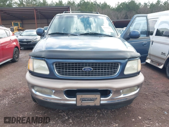 1998 Ford Expedition XLT with VIN 1FMRU17L1WLA99979, listed as a IAAI auction lot 41569667 with 215,937 mi miles. Bid and sale history available at carsss.com. Image 6.