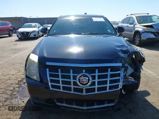 2013 Cadillac CTS Luxury with VIN 1G6DE5E51D0165634, listed as a IAAI auction lot 42208023 with 92,827 mi miles and . Bid and sale history available at DreamBid. Image 12.