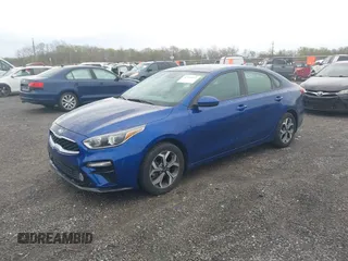 2019 Kia Forte LXS z VIN 3KPF24AD6KE041448, wystawiony jako IAAI lot #42035571 z przebiegiem 128 536 mil mil oraz . Historia ofert i sprzedaży dostępna na DreamBid. Obrazek 2.
