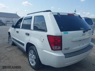 2006 Jeep Grand Cherokee Laredo with VIN 1J4GR48K36C334509, listed as a IAAI auction lot 40343794 with 202,746 mi miles. Bid and sale history available at carsss.com. Image 3.