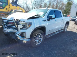 2019 GMC Sierra 1500 SLT with VIN 1GTU9DED3KZ116883, listed as a IAAI auction lot 41828826 with 128,062 mi miles. Bid and sale history available at carsss.com. Image 2.