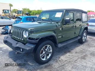 2022 Jeep Wrangler Unlimited Sahara z VIN 1C4HJXEN3NW242458, wystawiony jako IAAI lot #42352073 z przebiegiem 26 154 mil mil oraz . Historia ofert i sprzedaży dostępna na DreamBid. Obrazek 17.