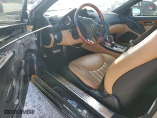 2009 Mercedes-Benz SL-Class V8 with VIN WDBSK71F09F144591, listed as a Copart auction lot 46873785 with 63,977 mi miles and Salvage Title. Bid and sale history available at carsss.com. Image 8.