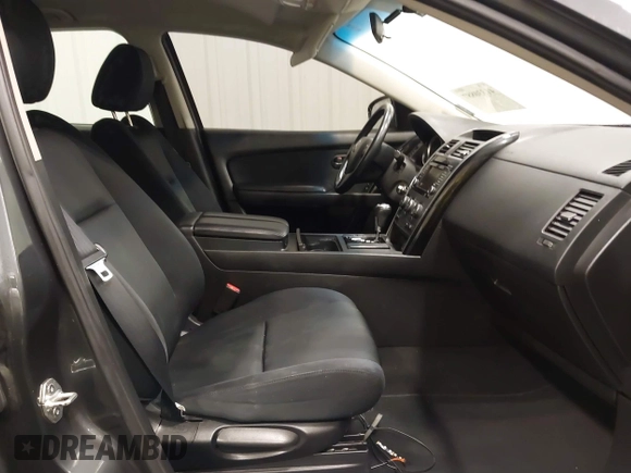2015 Mazda CX-9 Sport with VIN JM3TB2BA1F0453620, listed as a IAAI auction lot 41330887 with 119,219 mi miles and . Bid and sale history available at carsss.com. Image 5.