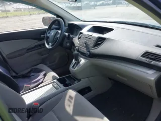 2014 Honda CR-V LX with VIN 3CZRM3H34EG702492, listed as a IAAI auction lot 42096296 with 63,748 mi miles and . Bid and sale history available at carsss.com. Image 5.