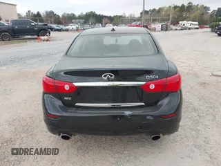 2015 Infiniti Q50 Premium z VIN JN1BV7ARXFM410177, wystawiony jako IAAI lot #41936999 z przebiegiem 129 123 mil mil oraz . Historia ofert i sprzedaży dostępna na DreamBid. Obrazek 16.
