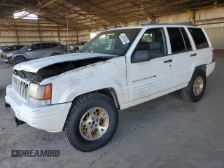 1996 Jeep Grand Cherokee with VIN 1J4EZ78Y9TC104398, listed as a Copart auction lot 69706254 with Not provided miles and Salvage title. Bid and sale history available at DreamBid. Image 1.