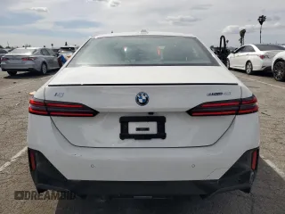 2024 BMW i5 eDrive40 with VIN WBY33FK04RCR92576, listed as a Copart auction lot 51180875 with 11,289 mi miles and Salvage title. Bid and sale history available at DreamBid. Image 6.