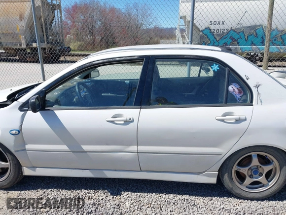 2002 Mitsubishi Lancer OZ-Rally with VIN JA3AJ86E42U039140, listed as a IAAI auction lot 41853888 with 328,181 mi miles and . Bid and sale history available at DreamBid. Image 14.