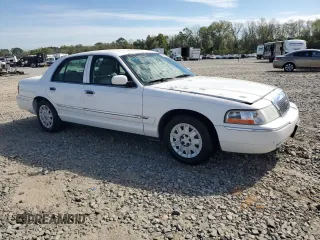 2004 Mercury Grand Marquis GS z VIN 2MEFM74WX4X640485, wystawiony jako Copart lot #50902855 z przebiegiem 104 350 mil mil oraz Szkoda całkowita • Salvage title. Historia ofert i sprzedaży dostępna na DreamBid. Obrazek 4.