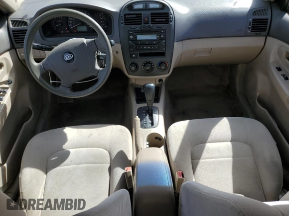 2006 Kia Spectra EX with VIN KNAFE121565364950, listed as a Copart auction lot 48860895 with 209,615 mi miles and Salvage Title. Bid and sale history available at DreamBid. Image 8.