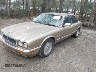 1997 Jaguar XJ with VIN SAJHX1245VC788530, listed as a IAAI auction lot 41768247 with 215,807 mi miles and . Bid and sale history available at DreamBid. Image 2.